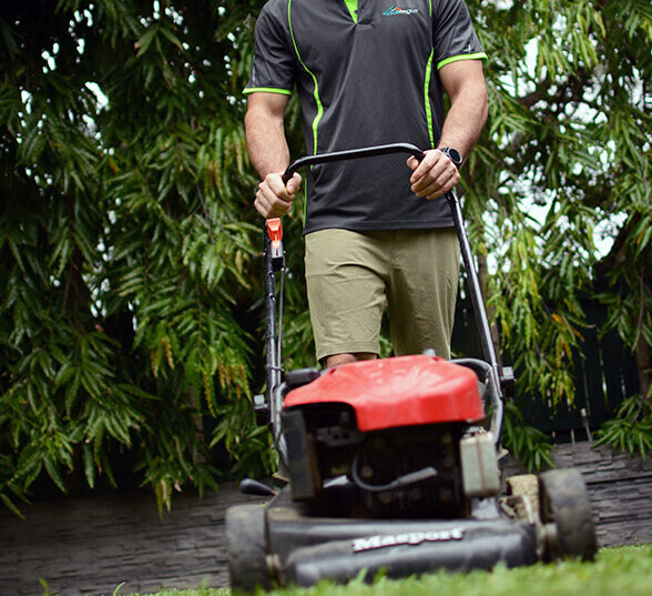 man mowing